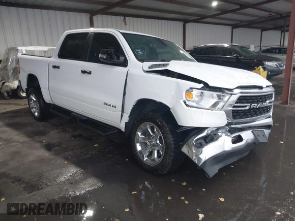 2023 Ram 1500 Big Horn z VIN 1C6RRFFG7PN698664, wystawiony jako IAAI lot #41103495 z przebiegiem 34 307 mil mil oraz . Historia ofert i sprzedaży dostępna na DreamBid. Obrazek 1.