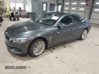 2014 BMW 4 Series 428i xDrive with VIN WBA3N9C56EF721564, listed as a IAAI auction lot 41737409 with 42,052 mi miles and . Bid and sale history available at DreamBid. Image 2.