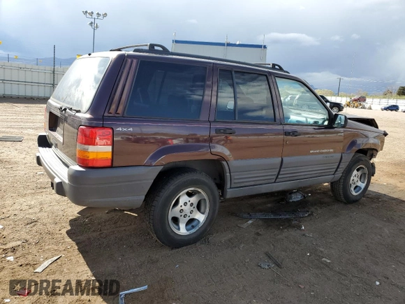 1997 Jeep Grand Cherokee Laredo with VIN 1J4GZ58S1VC747713, listed as a Copart auction lot 55290275 with 159,846 mi miles and Salvage title. Bid and sale history available at DreamBid. Image 3.