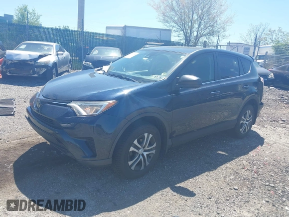 2017 Toyota RAV4 LE with VIN JTMBFREV8HJ168975, listed as a IAAI auction lot 42139354 with 91,394 mi miles and . Bid and sale history available at DreamBid. Image 17.