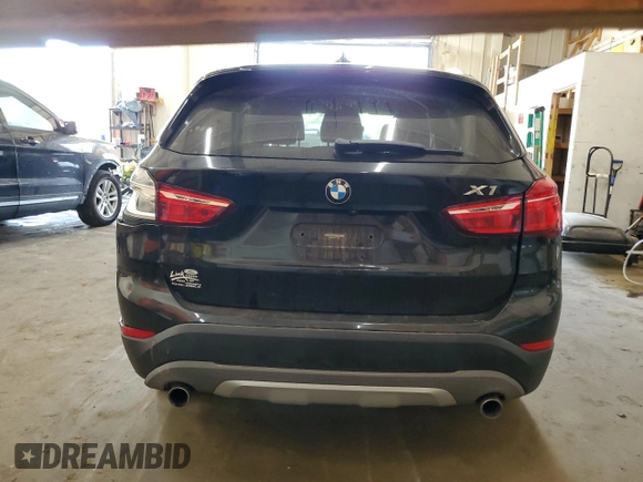 2018 BMW X1 xDrive28i with VIN WBXHT3C31J5L24230, listed as a Copart auction lot 56665305 with Not provided miles and Non repairable. Bid and sale history available at DreamBid. Image 6.