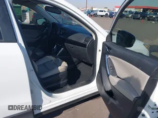2014 Mazda CX-5 Grand Touring with VIN JM3KE4DY4E0375809, listed as a IAAI auction lot 41468078 with 151,226 mi miles. Bid and sale history available at carsss.com. Image 5.