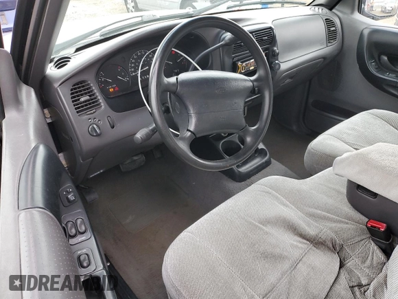2000 Ford Ranger XL with VIN 1FTYR14V1YTA91858, listed as a Copart auction lot 54863035 with 244,120 mi miles and Salvage Title. Bid and sale history available at DreamBid. Image 8.