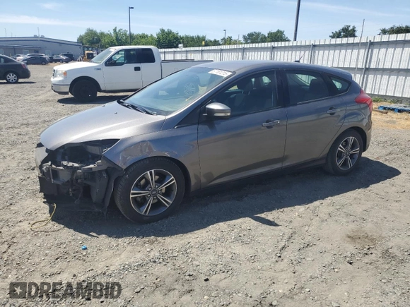 2014 Ford Focus SE z VIN 1FADP3K24EL317353, wystawiony jako Copart lot #57181215 z przebiegiem 144 495 mil mil oraz Szkoda całkowita • Salvage title. Historia ofert i sprzedaży dostępna na DreamBid. Obrazek 1.