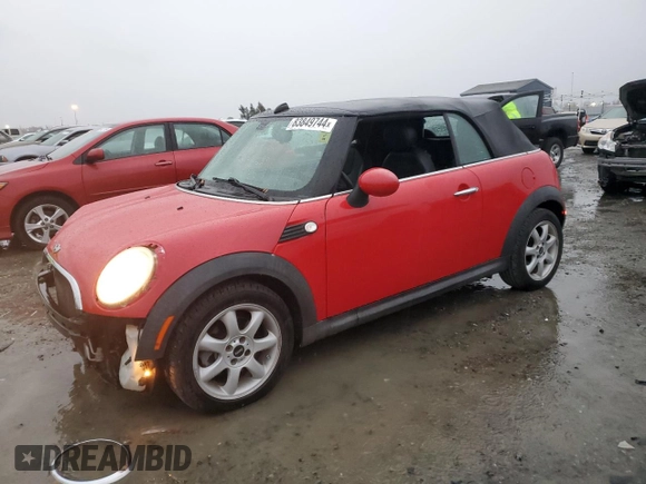 2009 MINI Convertible with VIN WMWMR33539TU96291, listed as a Copart auction lot 83849744 with 65,056 mi miles and Salvage title. Bid and sale history available at DreamBid. Image 1.