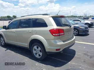 2011 Dodge Journey Mainstreet with VIN 3D4PH1FG9BT565356, listed as a IAAI auction lot 42808442 with 202,574 mi miles and . Bid and sale history available at DreamBid. Image 3.