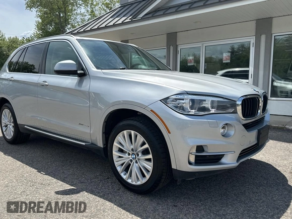 2016 BMW X5 xDrive40e z VIN 5UXKT0C52G0F74828, wystawiony jako Copart lot #58977975 z przebiegiem 122 045 mil mil oraz Czysty tytuł • Clean title. Historia ofert i sprzedaży dostępna na DreamBid. Obrazek 1.