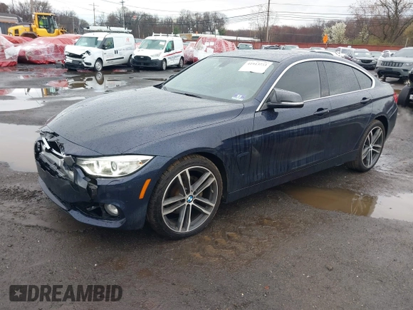 2016 BMW 4 Series 428i xDrive with VIN WBA4C9C59GG137067, listed as a IAAI auction lot 41913733 with 104,378 mi miles and . Bid and sale history available at carsss.com. Image 20.