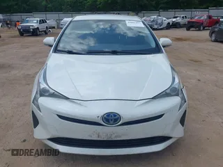 2017 Toyota Prius Two with VIN JTDKARFUXH3040780, listed as a IAAI auction lot 42091493 with 105,952 mi miles and . Bid and sale history available at DreamBid. Image 6.
