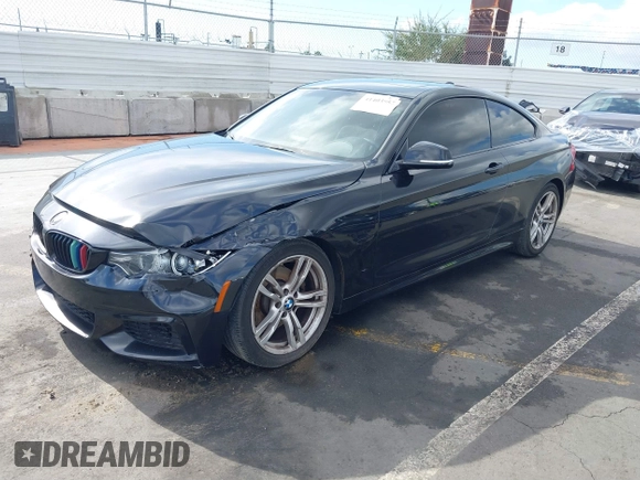 2014 BMW 4 Series 428i with VIN WBA3N7C55EF719504, listed as a IAAI auction lot 41403957 with 98,882 mi miles and . Bid and sale history available at carsss.com. Image 17.