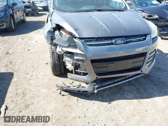 2013 Ford Escape SEL with VIN 1FMCU9H98DUB89046, listed as a IAAI auction lot 41794795 with 89,819 mi miles and . Bid and sale history available at DreamBid. Image 6.