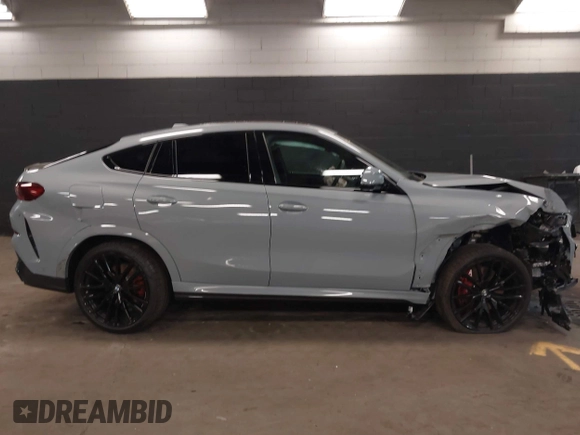2025 BMW X6 xDrive40i with VIN 5UX33EX04S9Z44291, listed as a IAAI auction lot 41827897 with 1,053 mi miles. Bid and sale history available at carsss.com. Image 13.