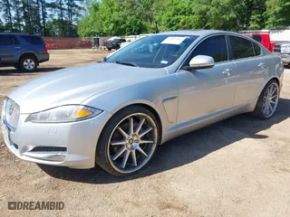 2015 Jaguar XF I4 T Premium with VIN SAJWA0FS6FPU73001, listed as a IAAI auction lot 42092684 with 126,956 mi miles. Bid and sale history available at carsss.com. Image 2.