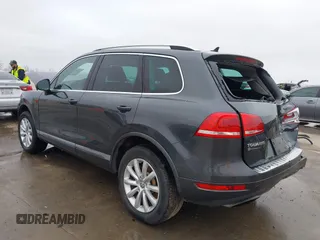 2012 Volkswagen Touareg Sport with VIN WVGEF9BP9CD008545, listed as a IAAI auction lot 41492653 with 138,424 mi miles and . Bid and sale history available at DreamBid. Image 3.