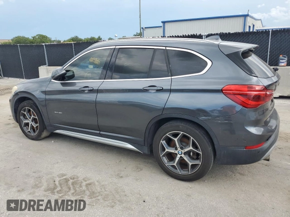 2017 BMW X1 xDrive28i with VIN WBXHT3C32H5F75870, listed as a Copart auction lot 64420385 with 158,640 mi miles and Clean title. Bid and sale history available at DreamBid. Image 2.