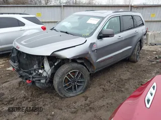 2021 Jeep Grand Cherokee Trailhawk with VIN 1C4RJFLG2MC579884, listed as a IAAI auction lot 41526769 with 115,461 mi miles. Bid and sale history available at carsss.com. Image 2.