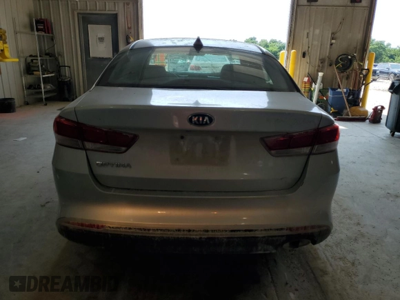 2016 Kia Optima LX with VIN 5XXGT4L35GG035838, listed as a Copart auction lot 59261495 with 128,848 mi miles and Salvage title. Bid and sale history available at DreamBid. Image 6.