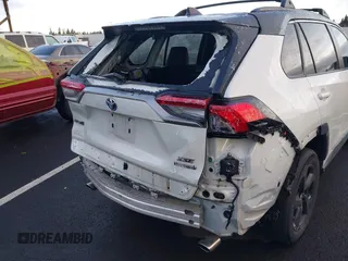 2021 Toyota RAV4 Hybrid XSE with VIN 4T3E6RFV8MU056524, listed as a IAAI auction lot 41788452 with 56,751 mi miles. Bid and sale history available at carsss.com. Image 18.