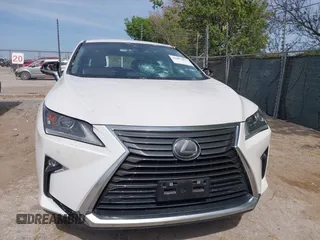 2019 Lexus RX 350 z VIN 2T2ZZMCA4KC126214, wystawiony jako IAAI lot #41881877 z przebiegiem 91 419 mil mil oraz . Historia ofert i sprzedaży dostępna na DreamBid. Obrazek 12.