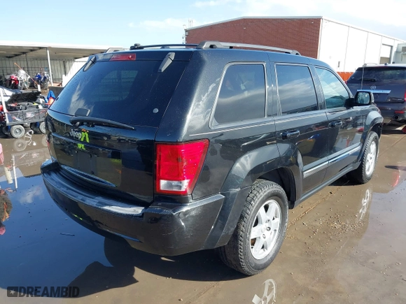 2010 Jeep Grand Cherokee Laredo with VIN 1J4PS4GK9AC101152, listed as a IAAI auction lot 41706626 with 182,265 mi miles. Bid and sale history available at carsss.com. Image 4.