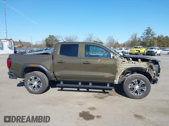 2023 GMC Canyon 4WD AT4 with VIN 1GTP6DEK1P1174713, listed as a IAAI auction lot 41733242 with 35,705 mi miles. Bid and sale history available at carsss.com. Image 13.