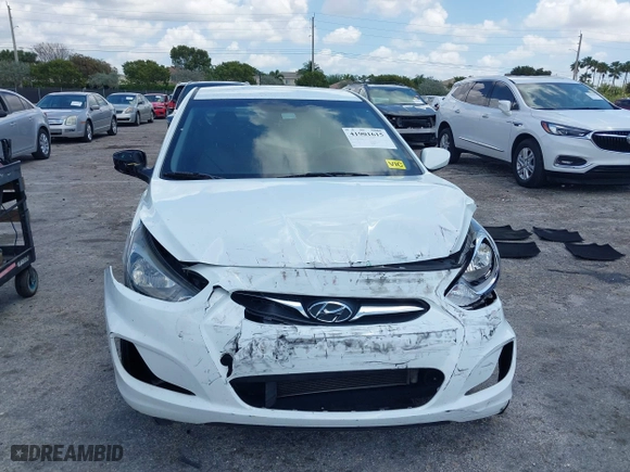 2013 Hyundai Accent GL with VIN KMHCT5AE1DU092600, listed as a IAAI auction lot 41901615 with 126,327 mi miles. Bid and sale history available at carsss.com. Image 6.