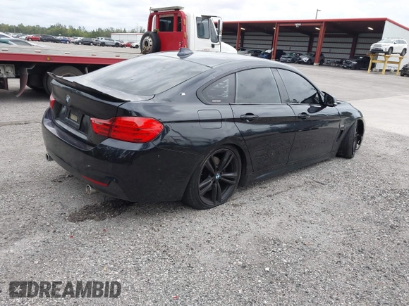 2015 BMW 4 Series 435i with VIN WBA4B1C5XFD955119, listed as a IAAI auction lot 41349918 with 181,937 mi miles and . Bid and sale history available at carsss.com. Image 4.