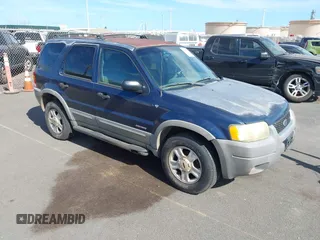 2002 Ford Escape XLT with VIN 1FMCU03192KA63624, listed as a IAAI auction lot 42545147 with 189,522 mi miles and . Bid and sale history available at DreamBid. Image 1.
