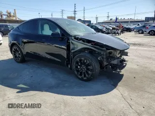 2022 Tesla Model Y Long Range z VIN 7SAYGDEE2NF442073, wystawiony jako Copart lot #49180135 z przebiegiem 34 742 mil mil oraz Szkoda całkowita • Salvage title. Historia ofert i sprzedaży dostępna na DreamBid. Obrazek 12.