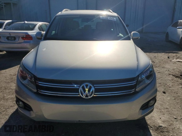 2012 Volkswagen Tiguan SE z VIN WVGAV7AX9CW531219, wystawiony jako Copart lot #81881644 z przebiegiem 125 695 mil mil oraz Szkoda całkowita • Salvage title. Historia ofert i sprzedaży dostępna na DreamBid. Obrazek 5.