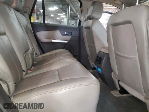 2013 Ford Edge Limited z VIN 2FMDK4KC0DBC38473, wystawiony jako Copart lot #57431855 z przebiegiem 122 622 mil mil oraz Szkoda całkowita • Salvage title. Historia ofert i sprzedaży dostępna na DreamBid. Obrazek 11.