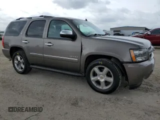 2012 Chevrolet Tahoe LTZ z VIN 1GNSCCE02CR259655, wystawiony jako Copart lot #55184505 z przebiegiem 199 189 mil mil oraz Szkoda całkowita • Salvage title. Historia ofert i sprzedaży dostępna na DreamBid. Obrazek 4.