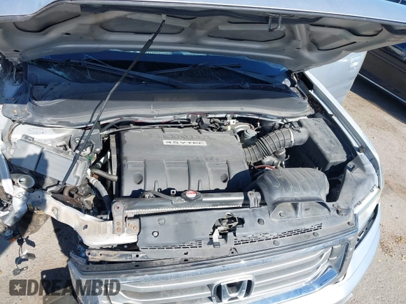 2012 Honda Ridgeline RTL with VIN 5FPYK1F56CB457687, listed as a IAAI auction lot 42582331 with 96,357 mi miles and . Bid and sale history available at DreamBid. Image 10.