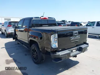2022 GMC Canyon 2WD Elevation with VIN 1GTG5CEN5N1151794, listed as a IAAI auction lot 41876656 with 57,305 mi miles. Bid and sale history available at carsss.com. Image 3.