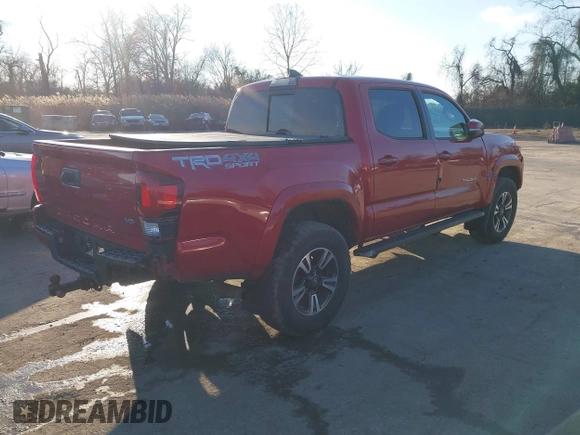 2018 Toyota Tacoma SR with VIN 3TMCZ5ANXJM154305, listed as a IAAI auction lot 41557497 with 182,624 mi miles and . Bid and sale history available at DreamBid. Image 4.