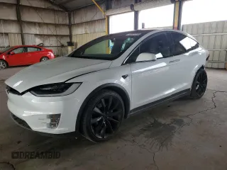 2018 Tesla Model X 75D with VIN 5YJXCBE23JF133589, listed as a Copart auction lot 55573715 with 89,234 mi miles and Salvage Title. Bid and sale history available at DreamBid. Image 1.