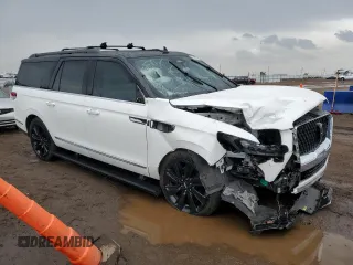 2022 Lincoln Navigator Black Label z VIN 5LMJJ3TT5NEL12844, wystawiony jako Copart lot #58589635 z przebiegiem Nie podano mil oraz Szkoda całkowita • Salvage title. Historia ofert i sprzedaży dostępna na DreamBid. Obrazek 4.
