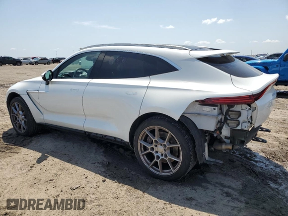 2021 Aston Martin DBX z VIN SCFVUJAW8MTV02781, wystawiony jako Copart lot #56249665 z przebiegiem 19 901 mil mil oraz Szkoda całkowita • Salvage title. Historia ofert i sprzedaży dostępna na DreamBid. Obrazek 2.