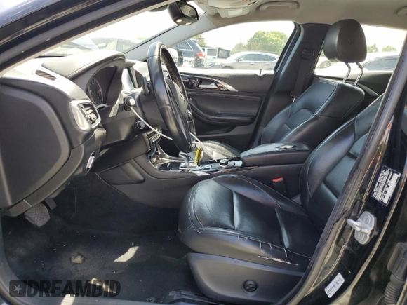 2018 Infiniti QX30 Luxury with VIN SJKCH5CR5JA056439, listed as a Copart auction lot 56048085 with 121,060 mi miles and Salvage title. Bid and sale history available at DreamBid. Image 7.