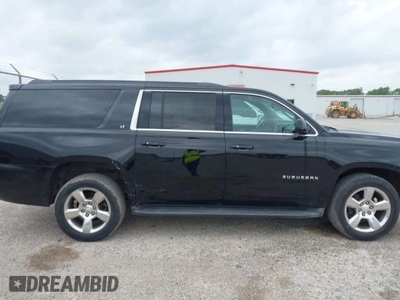 2016 Chevrolet Suburban LT with VIN 1GNSKHKC4GR233059, listed as a IAAI auction lot 42137869 with 115,571 mi miles. Bid and sale history available at carsss.com. Image 13.