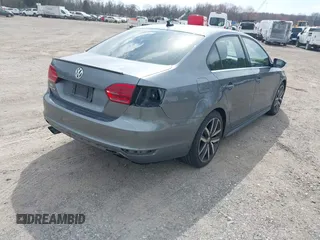 2013 Volkswagen Jetta Autobahn with VIN 3VW4T7AJ7DM451077, listed as a IAAI auction lot 41855053 with 75,207 mi miles and . Bid and sale history available at DreamBid. Image 4.