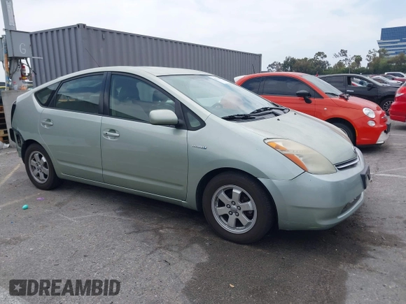 2007 Toyota Prius z VIN JTDKB20U477626959, wystawiony jako IAAI lot #42272184 z przebiegiem 179 443 mil mil oraz . Historia ofert i sprzedaży dostępna na DreamBid. Obrazek 1.