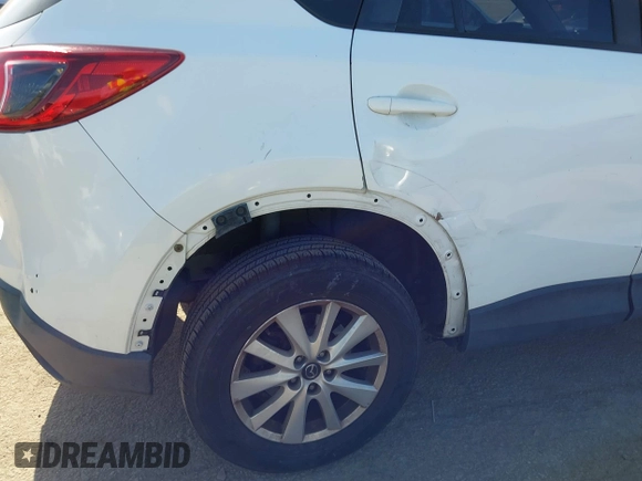 2013 Mazda CX-5 Sport with VIN JM3KE2BE4D0153251, listed as a IAAI auction lot 42297235 with 177,019 mi miles and . Bid and sale history available at DreamBid. Image 20.