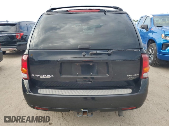 2003 Oldsmobile Bravada z VIN 1GHDT13S632357164, wystawiony jako Copart lot #75089244 z przebiegiem Nie podano mil oraz Szkody całkowita. Historia ofert i sprzedaży dostępna na DreamBid. Obrazek 6.