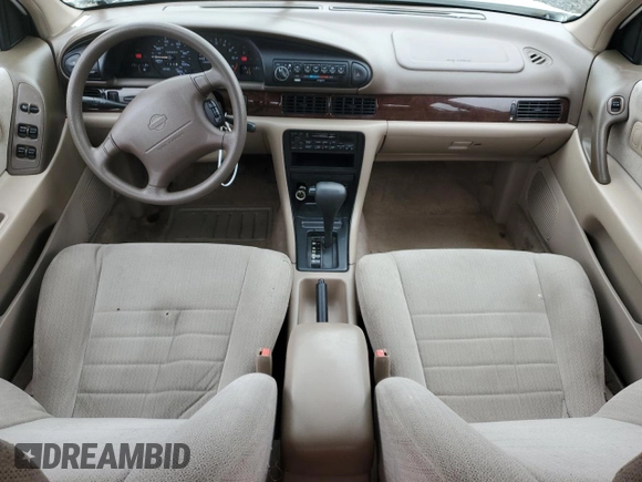 1997 Nissan Altima XE with VIN 1N4BU31D2VC235401, listed as a Copart auction lot 74559934 with 122,653 mi miles and Salvage Title. Bid and sale history available at carsss.com. Image 8.