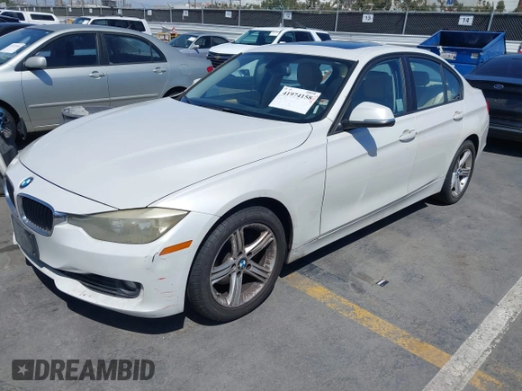 2013 BMW 3 Series 328i with VIN WBA3A5C51DF352812, listed as a IAAI auction lot 41974158 with 176,951 mi miles. Bid and sale history available at carsss.com. Image 2.
