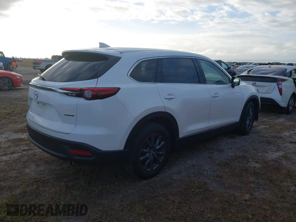 2021 Mazda CX-9 Touring with VIN JM3TCACY3M0505376, listed as a IAAI auction lot 40524326 with 1 mi miles. Bid and sale history available at carsss.com. Image 4.
