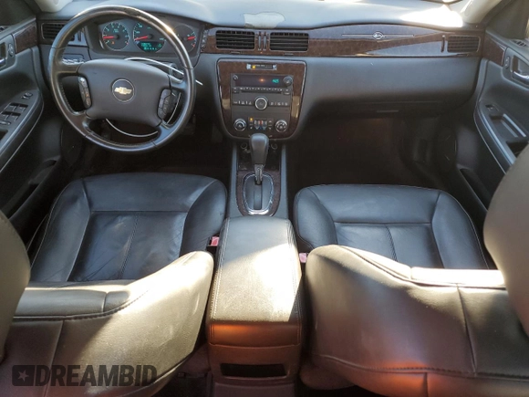 2014 Chevrolet Impala LTZ with VIN 2G1WC5E34E1121605, listed as a Copart auction lot 82705244 with 174,886 mi miles and Salvage Title. Bid and sale history available at DreamBid. Image 8.