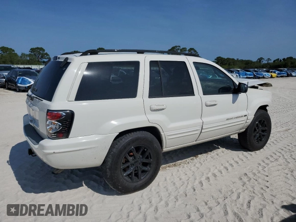 2002 Jeep Grand Cherokee Limited with VIN 1J4GX58S52C121941, listed as a Copart auction lot 55472015 with 182,225 mi miles and Salvage Title. Bid and sale history available at DreamBid. Image 3.