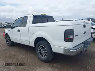 2004 Ford F-150 XLT with VIN 1FTRX12594KD71332, listed as a IAAI auction lot 42138488 with 170,234 mi miles. Bid and sale history available at carsss.com. Image 3.